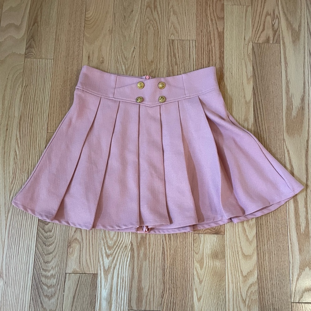 Chicwish Golden Button Pleated Flare Mini Skirt In Pink